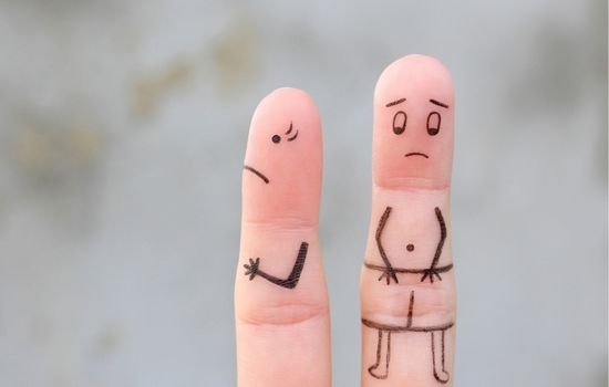 Prostatit ve cinsel sağlık sorunlarını temsil eden üzgün yüz ifadeli parmak çizimleri.